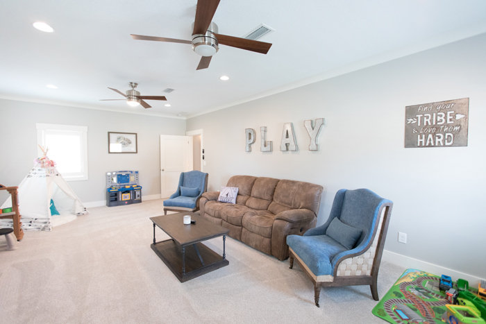 Grandchildrens play room, with couch, tepee, Life With Queenie Blog